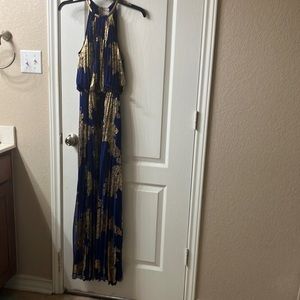 Halter royal blue with gold foil appliqué pleated and cinched at the waist. MSK